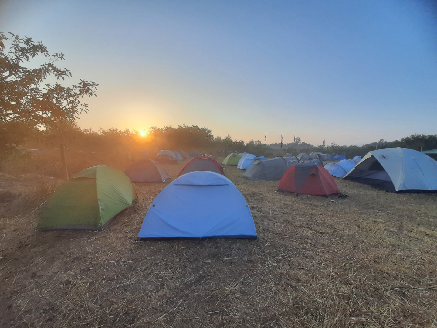 a sunrise at a camp