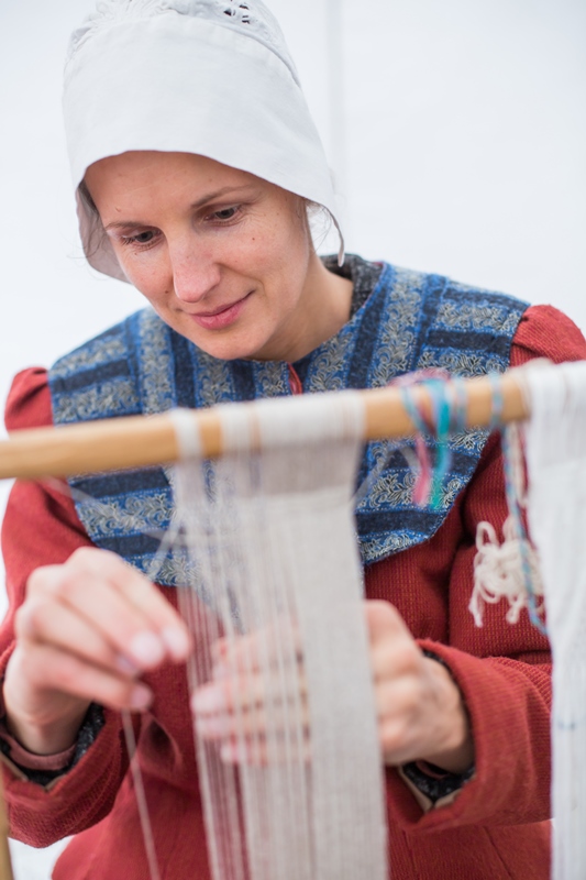 a woman weaving