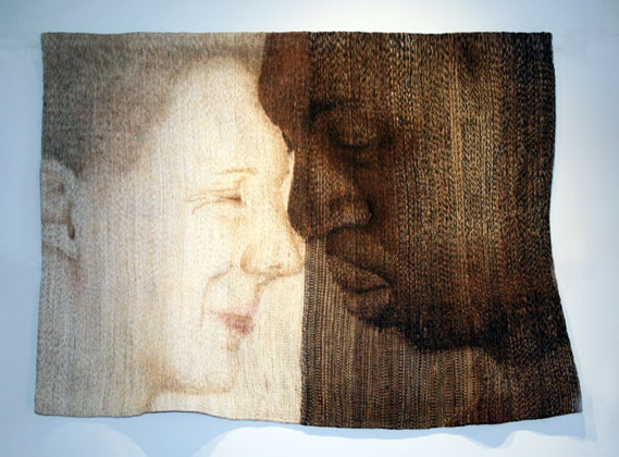 a tapestry representing a black man and a white woman