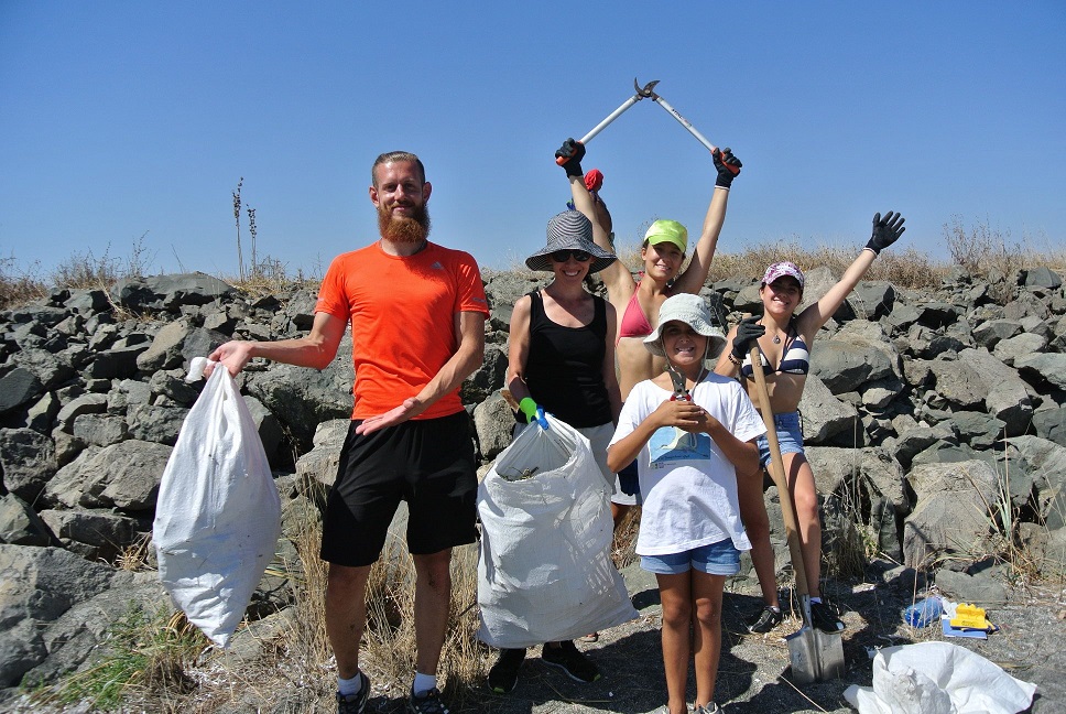 A group of volunteers collecting litter