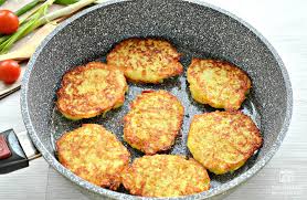 potato pancakes in a frypan